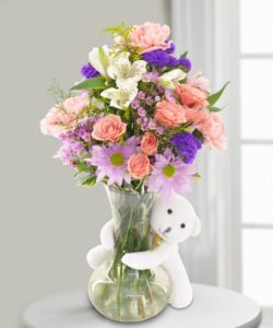 hugs for you bear bouquet pink, purple, peach flowers
